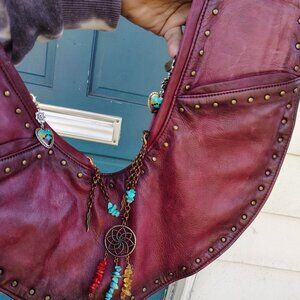 Absolutely stunning real leather Sash brand crossbody bag, studded